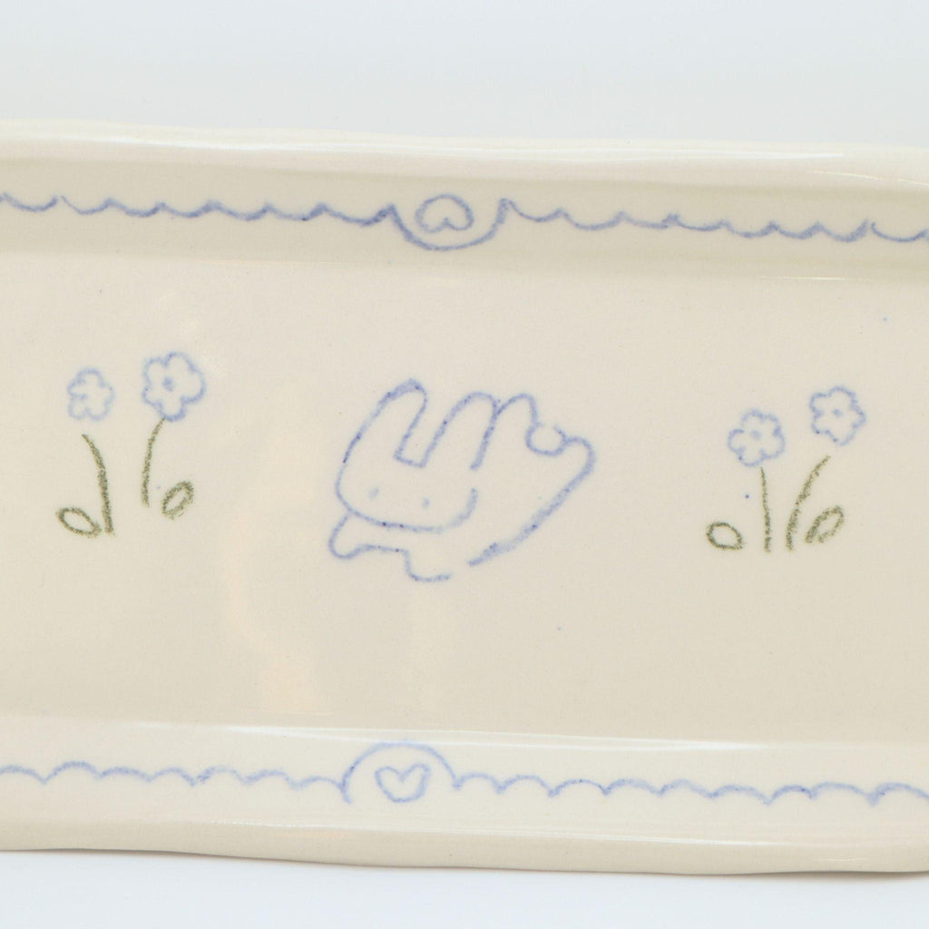In the flower field | Plate