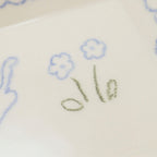 In the flower field | Plate