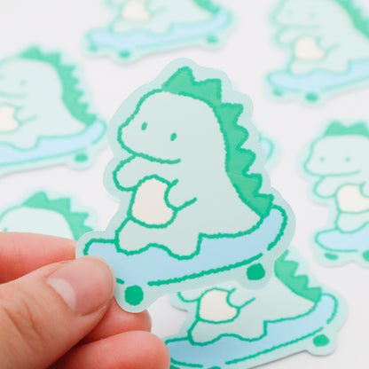 Skateboarding Dinosaur (green) | Sticker