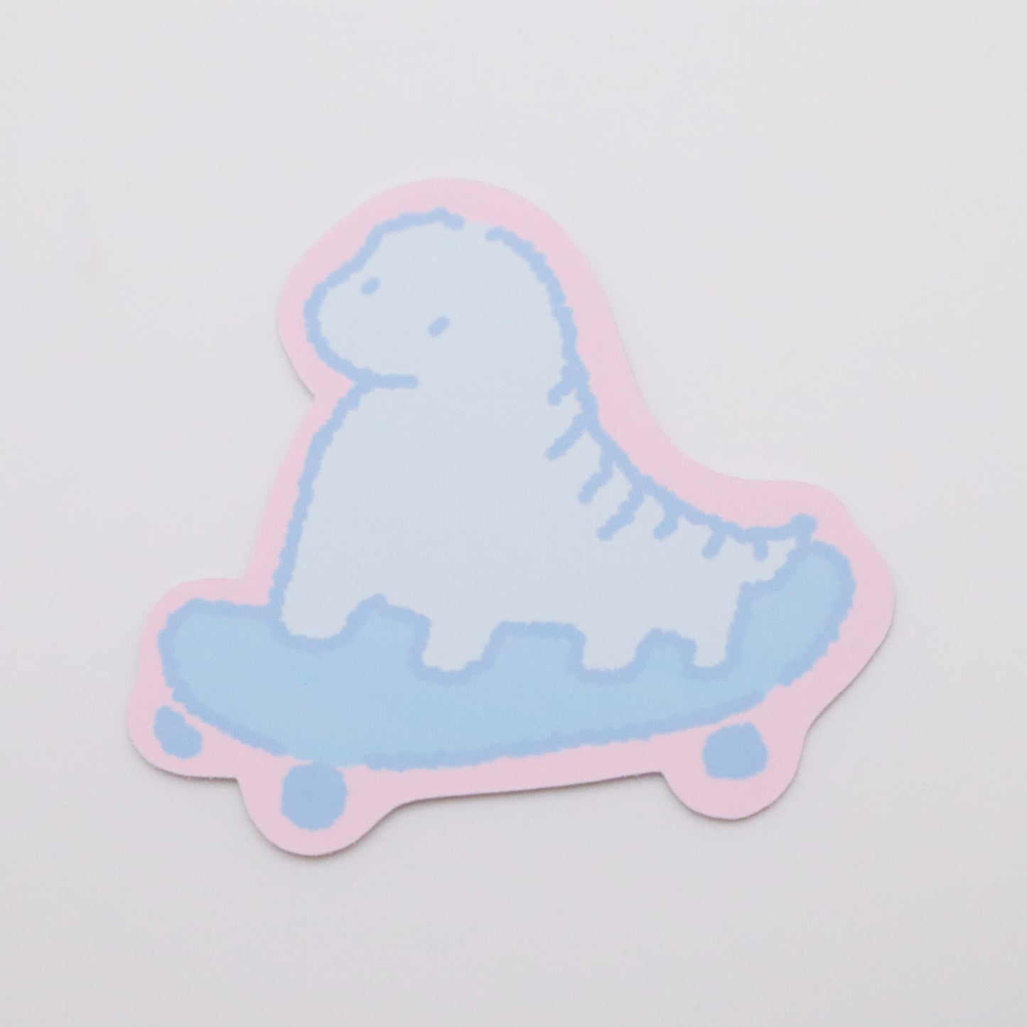 Skateboarding Dinosaur (blue) | Sticker