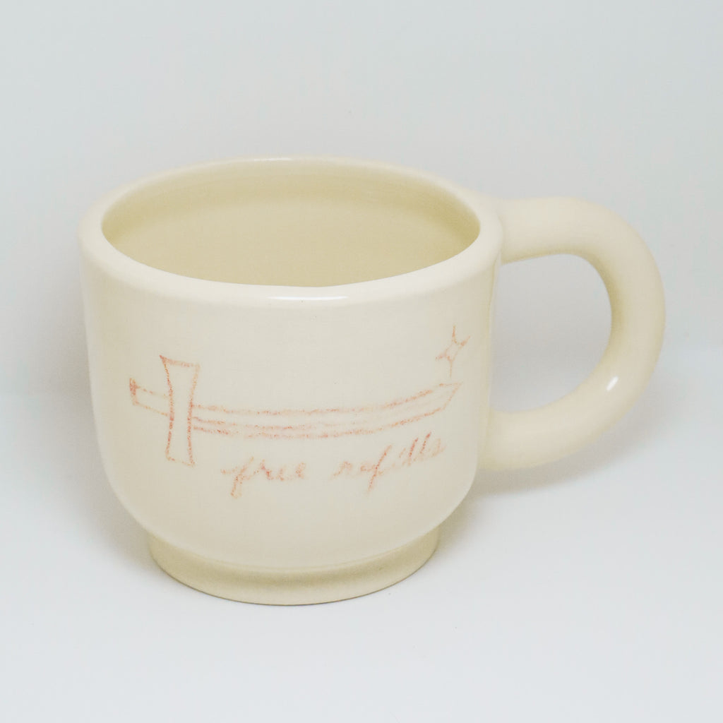 White ceramic mug with a handle on a white background